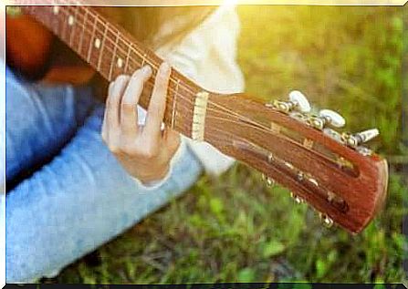 person playing guitar