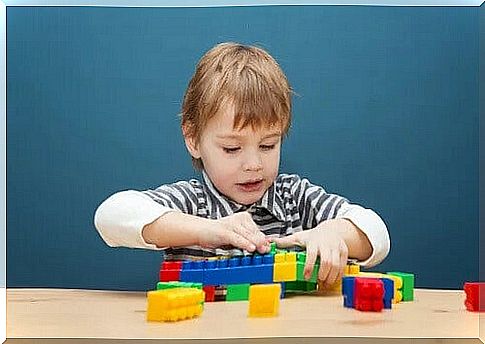 boy playing with construction games