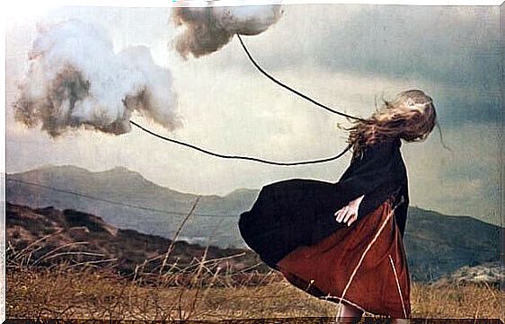 woman with clouds tied