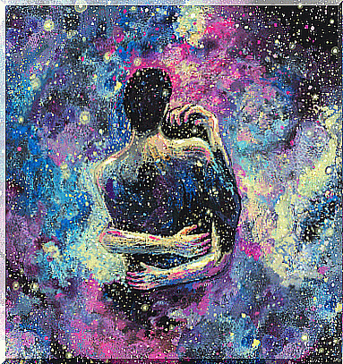 Couple embraced in a starry universe