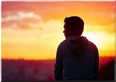 thoughtful man at sunset