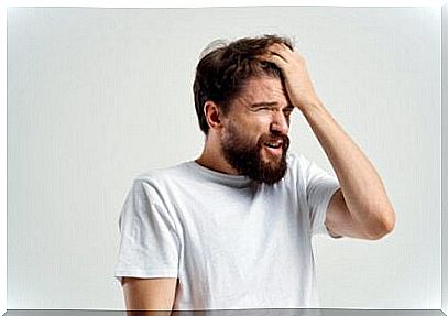 Man with his hand on his head for having forgotten something