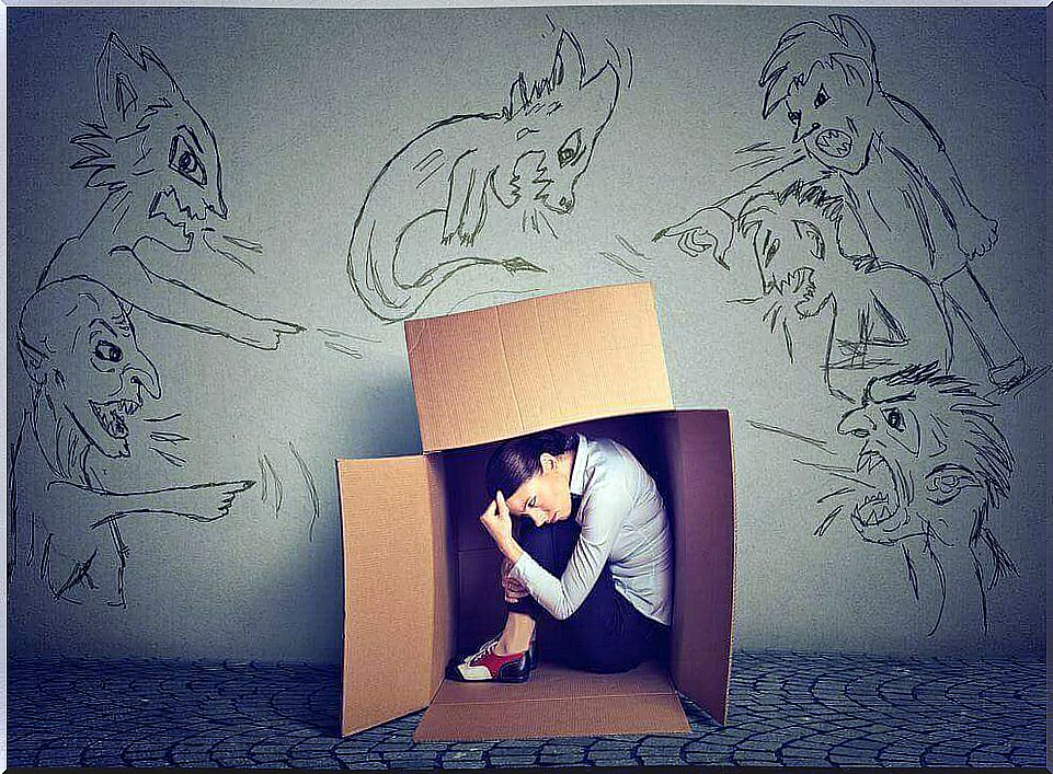 woman sitting inside box