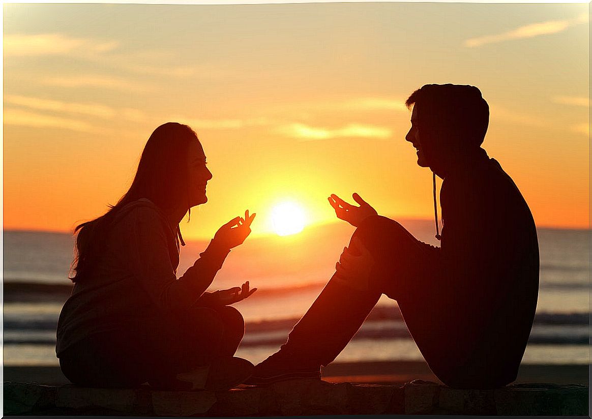 Friends chatting at sunset